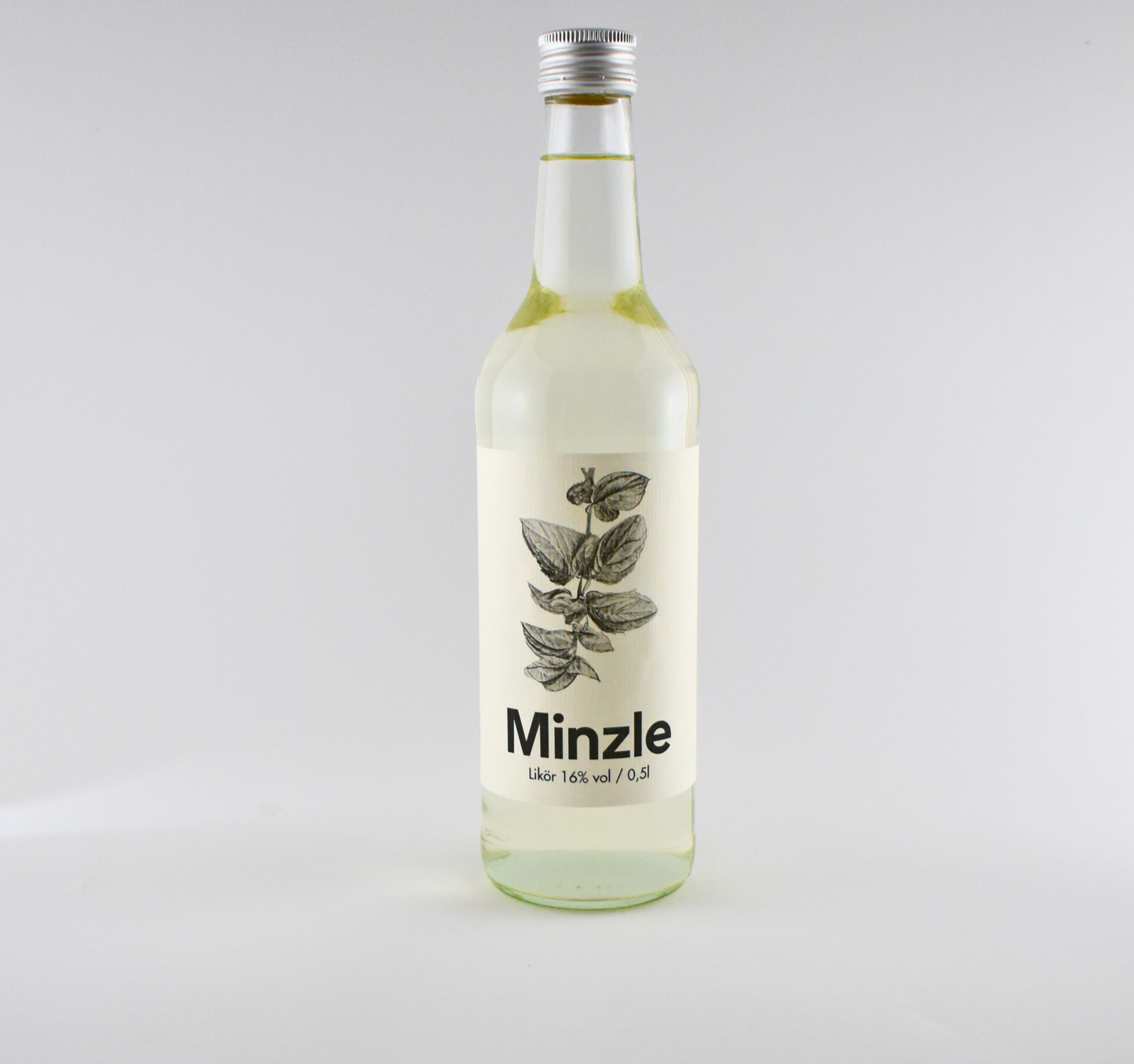 Minzle 16% vol. mint liqueur bottle, handcrafted with Alpine view, perfect for cocktails or on ice.